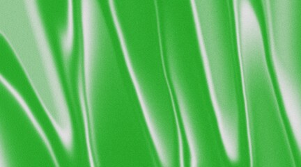 Green smooth flowing abstract silk textile background wallpaper with copy space