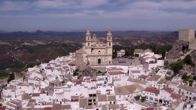 Aerial view of historic town with church, castle, and whitewashed houses, Olvera, Cadiz, Spain.