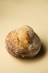 Delicious homemade unleavened round bread in the shape of a volcano on a wooden board