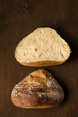 Homemade bread cut in half. Still life in a rustic style, close-up