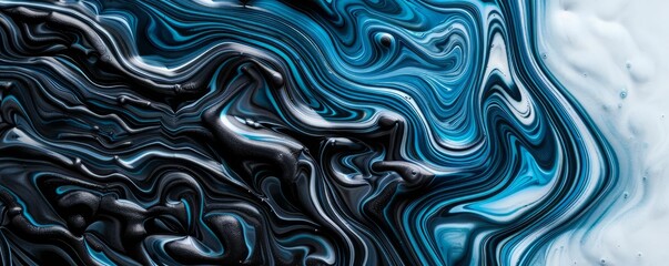 Fototapeta premium Abstract swirling blue and black marble background.