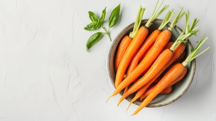 Baby carrots in bowl on white background side view with empty space