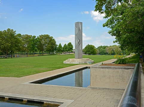 Totem, public artwork by American-Spanish artist Rinaldo Paluzzi,  on grounds of White River State Park, Indianapolis, Indiana, United States
