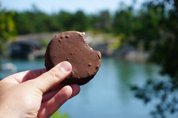 Cropped hand holding a ice cream