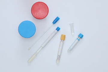 Medical test tubes and jars for tests on white background