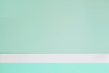 Obraz premium Vibrant turquoise wall with a white shelf for showcasing products, providing ample space for marketing. Perfect for modern businesses