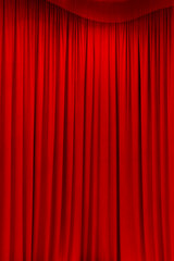 	
red theater curtain that dropped down as a straight line. Background for inserting text, empty spaces.	