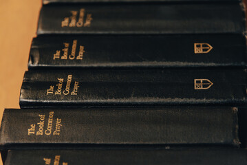 Stack of Bookc of Common Prayer