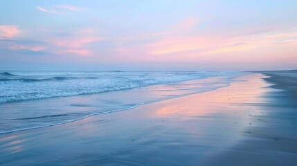 A serene beach at dusk with pastel-colored sky reflecting on the calm waves, creating a peaceful and tranquil atmosphere.