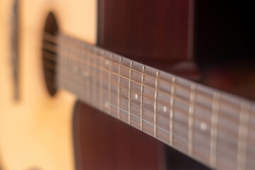 guitar from light wood on a whith background. 