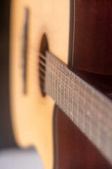 guitar from light wood on a whith background. 