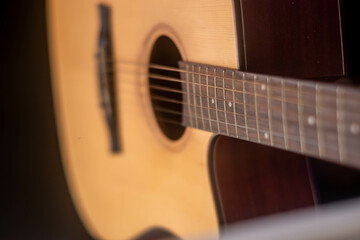guitar from light wood on a whith background. 