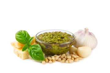 Pesto. Italian basil pesto sauce isolated on white background. Ingredient for pesto sauce: fresh basil, pine nuts, Parmesan cheese and olive oil. Space for text.Copy space.