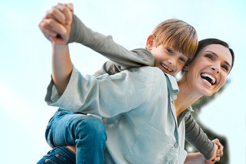 Happy, mom and boy with airplane in outdoor for bonding activity, playful fun and childhood happiness in park. Mother, child and back hug in nature for sunshine adventure, weekend break and affection