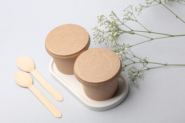 Craft take-away take-out food paper containers, cardboard round disposable packaging boxes on white background