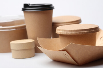 Eco cardboard containers for food and drinks on white background