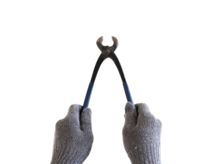 Hand holding old pliers with open ends on isolated background