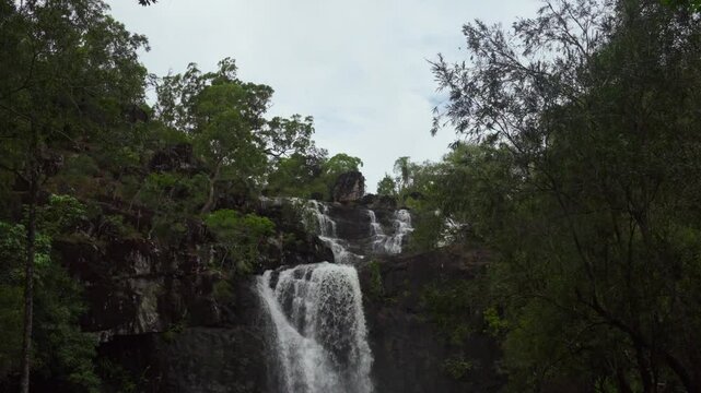 Cedar Creek Falls Whitsundays Airlie Beach Proserpine Waterfall slow motion river Australia reserve Palm Grove QLD Queensland Rainy wet season spring summer autumn winter sunny bluesky clouds down pan