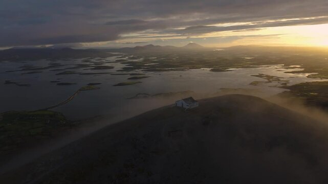 Drone footage of the small chapel at the summit of Croagh Patrick. 4K Cinematic Drone Footage - Co.Mayo - Ireland