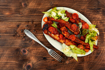 Delicious stewed pork ribs in sauce.