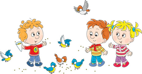 Fototapeta premium Happy little children feeding with corns a small flock of merry sparrows and titmice in a park, vector cartoon illustration on a white background