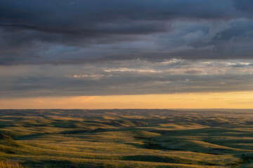 Sun setting over the Valley of 1000 Devils in Grasslands National Park, Saskatchewan, Canada
