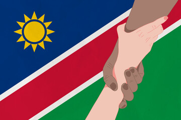 Helping hand against the Namibia flag. The concept of support. Two hands taking each other. A helping hand for those injured in the fighting, lend a hand