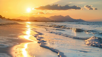 The sun setting behind a distant mountain range