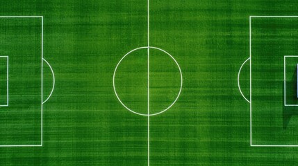 Aerial view of an empty soccer field with freshly mowed grass and clear field markings, providing a perfect setting for a competitive match.