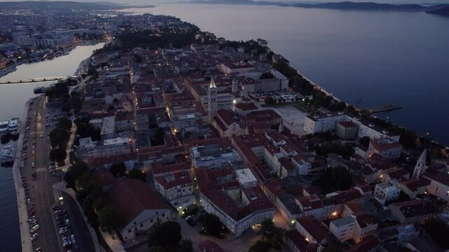 Aerial view of charming old town with picturesque harbour at sunrise, Zadar, Croatia.