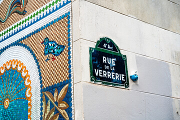 Street sign of Rue de la Verriere with mosaics and street art, a street with restaurants and warm atmosphere in the Marais, 4th arrondissment, Paris, France