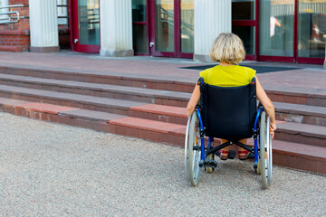 woman on wheelchair and stairs