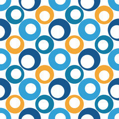 A seamless pattern of colorful circles in slightly, creating a vibrant, playful, and dynamic vector design.