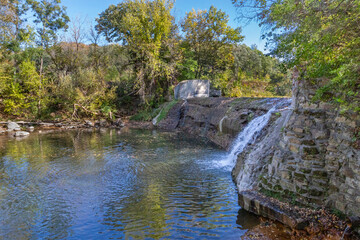 Historic Jordan Minnesota Waterfalls at Lagoon Park in the autumn during low water drought of Sand Creek