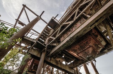 Former Sand Gravel Quarry on the Abandoned Industrial Site. Metal Constructions. Rusted Metal. Wallpaper. Background