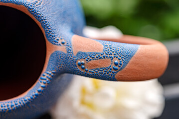 abstract blue clay glaze texture, close-up of clay pot, macro