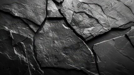 A black stone background with a smooth, polished surface and subtle veining, creating a sleek and sophisticated look perfect for high-end product photography or luxury designs