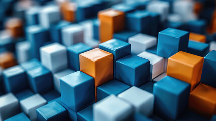 Obraz premium A computer-generated image of a field of 3D cubes in varying shades of blue and orange.