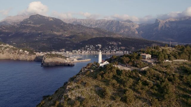 Aerial view of Soller at sunset with Balearic Sea and coastal cliffs, Mallorca, Spain.