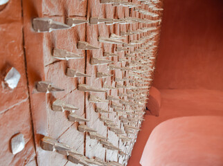 Red spiked iron main gate at Junagarh Fort in Bikaner