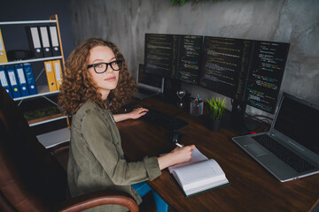 Photo of confident successful woman coder assistant dressed shirt sitting armchair modern...