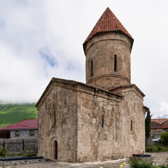 Fototapeta premium The Church of Kish, or the Church of Saint Elisha or Holy Mother of God Church, located in the village of Kish, Shaki, Azerbaijan. A prominent example of medieval architecture in the region