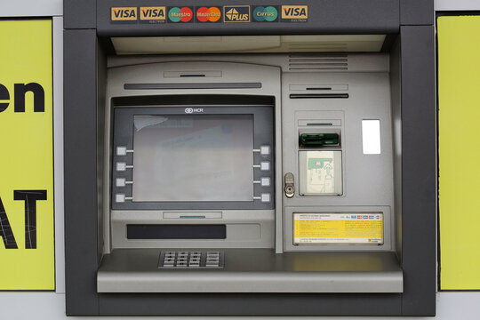 Automated Teller Machine All Cards Stickers at Bank Window