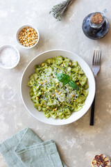 Farfalle pasta with pesto sauce. Healthy eating. Vegetarian food.