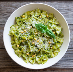 Farfalle pasta with pesto sauce. Healthy eating. Vegetarian food.