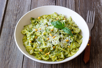 Farfalle pasta with pesto sauce. Healthy eating. Vegetarian food.