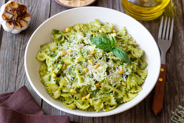 Farfalle pasta with pesto sauce. Healthy eating. Vegetarian food.