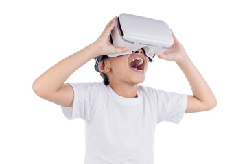 Naklejka premium Excited Asian child using virtual reality headset isolated on white background with clipping path. Future technology, immersive learning, gaming and metaverse concept.