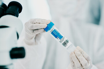 Doctor, hands or coronavirus vaccine in lab for medical wellness or healthcare, sample for test or...