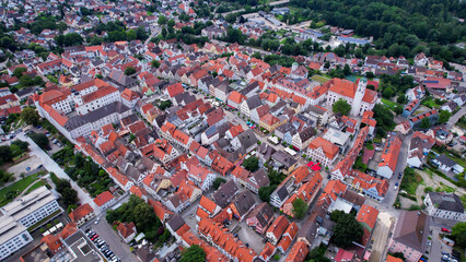 Aerial panorama around the old town of the city Günzburg, Guenzburg during an overcast summer day in Bavaria.